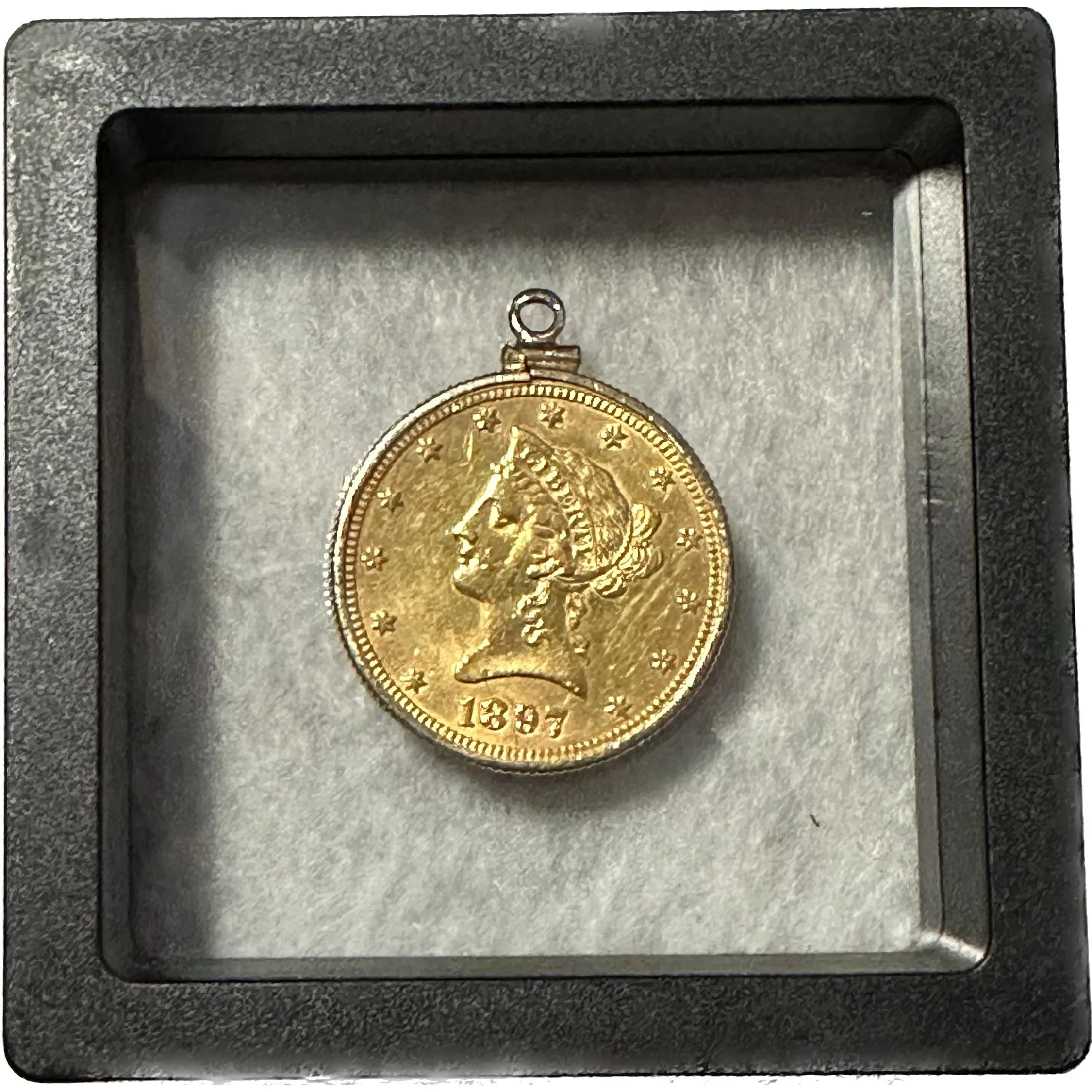 Gold U.S. Liberty Head $10 coin in bezel Prehistoric Online