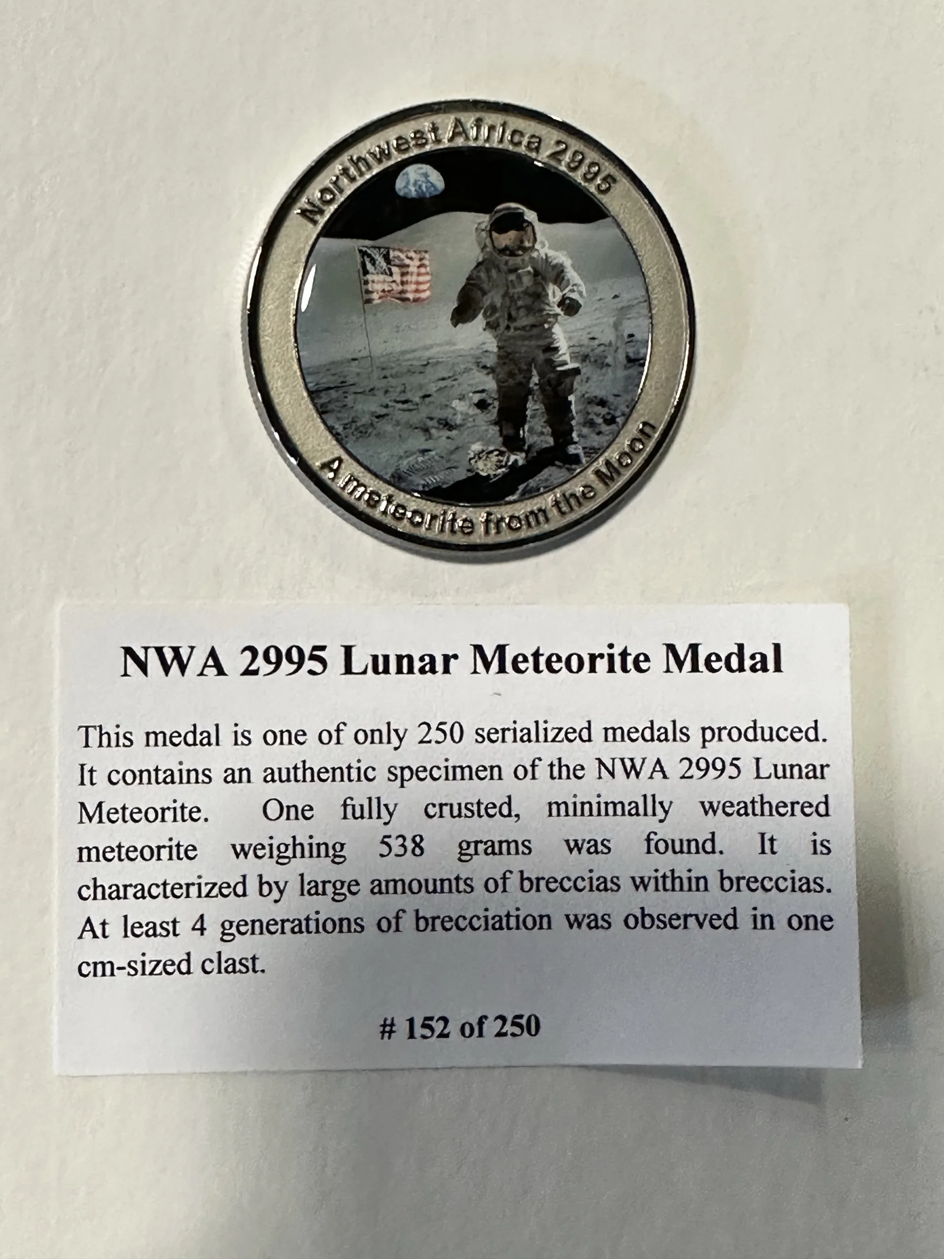 Meteorite coin, NWA 2995 Lunar Prehistoric Online
