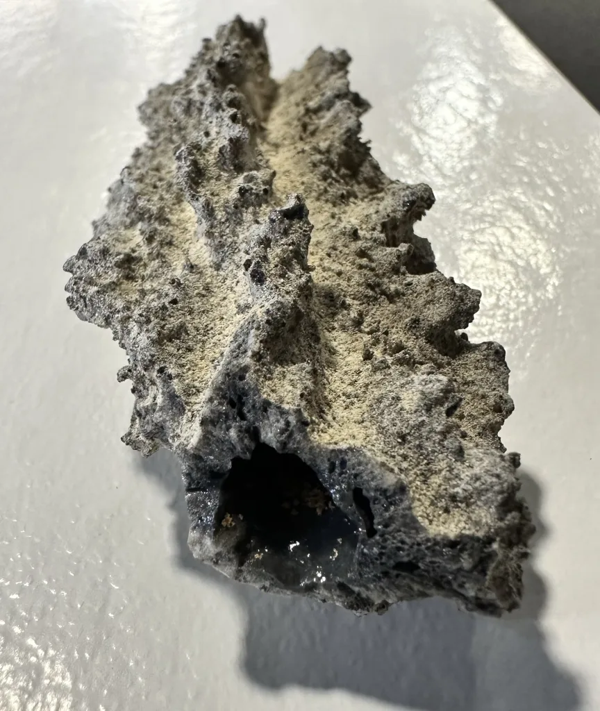 top and end view of a fulgurite from algeria