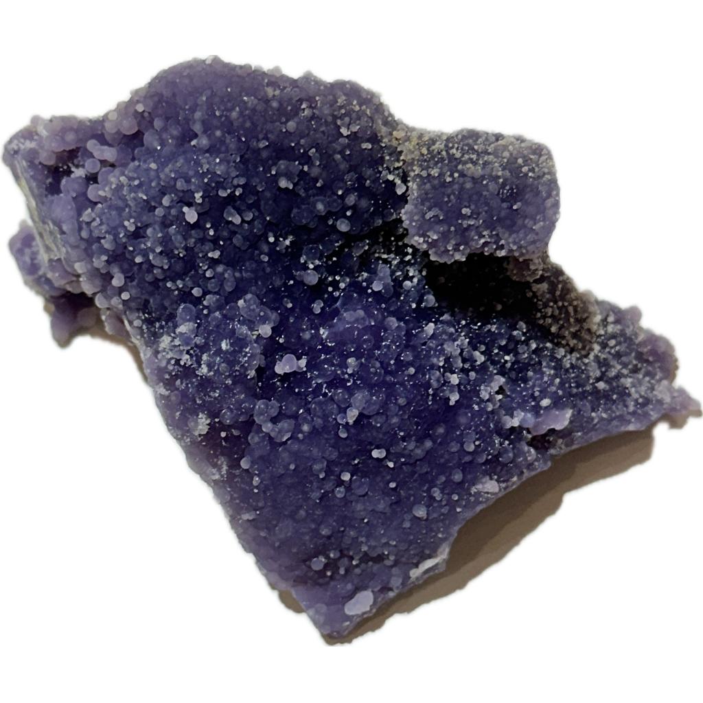 This is a picture of a deep purple grape agate cluster.