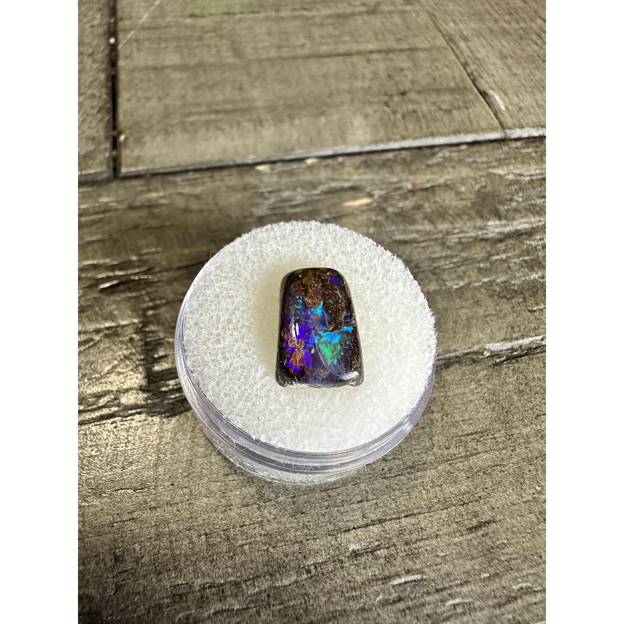 Opal, boulder Australia, beautiful dark colors Prehistoric Online