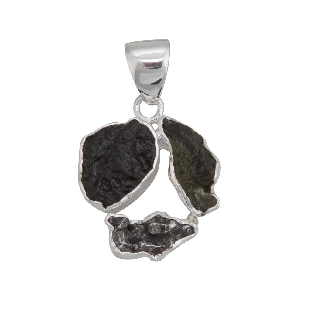 A Charles Albert original meteorite and tektite pendant. This pendant is crafted using sterling silver and all natural meteorite and tektites.