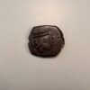 A finely detailed copper cob spanish shipwreck coin.
