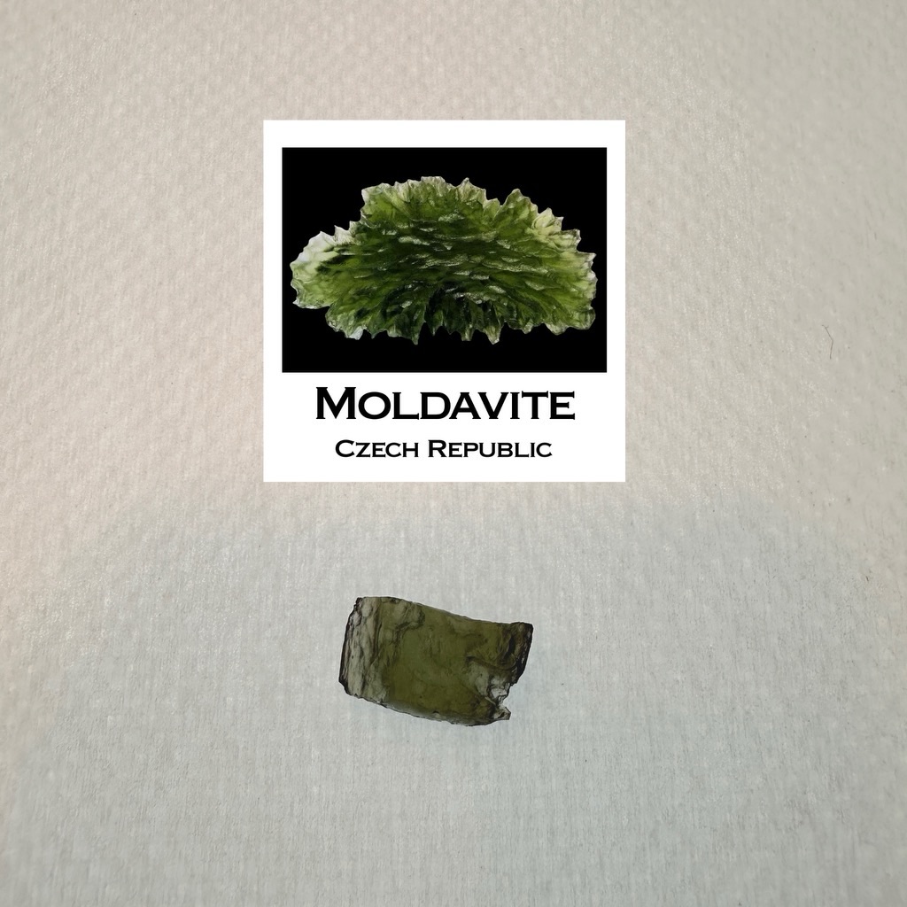 This unusual Moldavite tektite from the check Republic has a really unique curve which you don’t normally see. The color and the internal structure of this meteorite obsidian is truly breathtaking