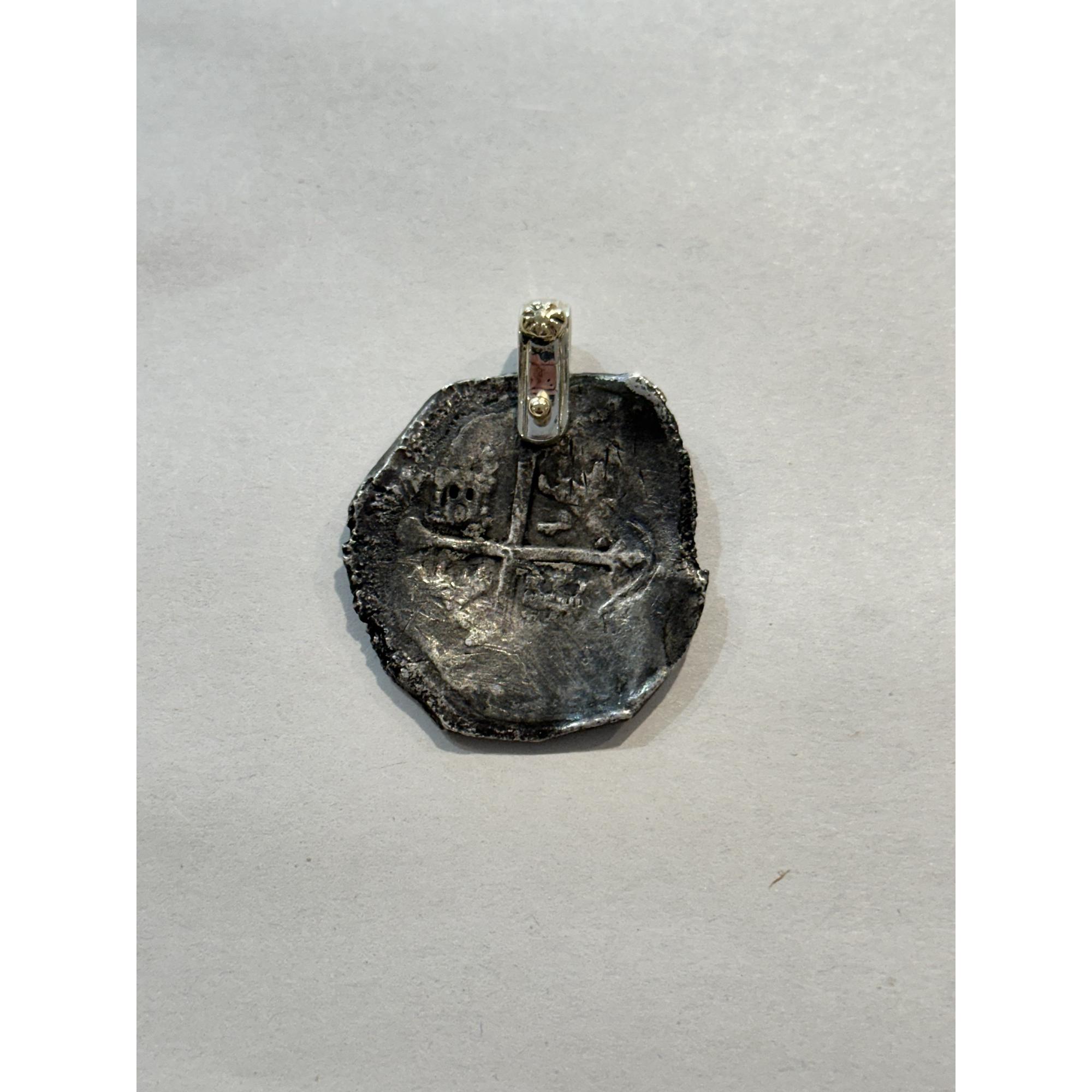 shipwreck coin with a sterling silver and 14k gold bail. 8 reale silver coin from site #212, early 1600s