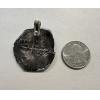 shipwreck silver 8 reale coin from 1600s. Rein of Philip 3 and 4. has a sterling and 14k gold bail