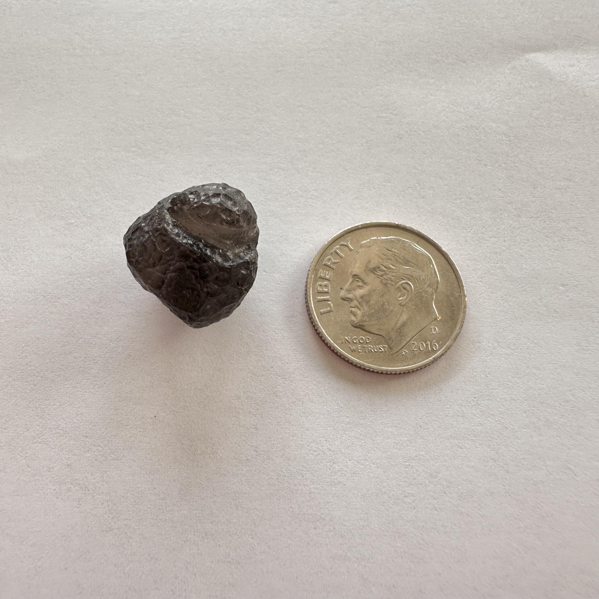 Colombianite from Colombia, great dimple shows the inner gas bubbles on this fabulous tektite